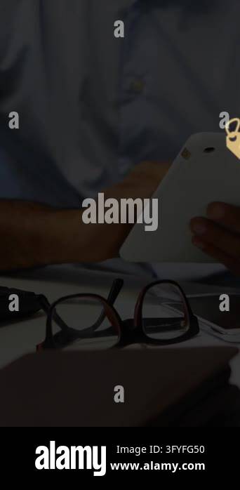 Animation of web of connections with icons floating over a man using a ...