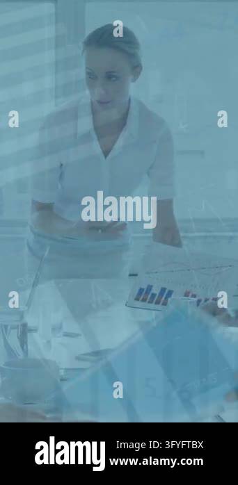 Animation of financial data processing over diverse colleagues having ...