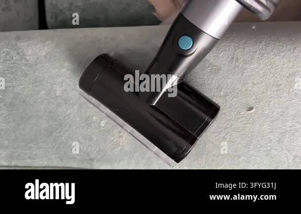 Sofa Clean Vector Close-up of a handheld vacuum cleaner removing dust, lint and pet hair ...