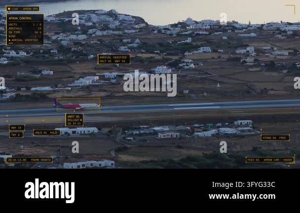 Aerial hover view of Mykonos, Greece at dusk: passenger jet rolling on ...