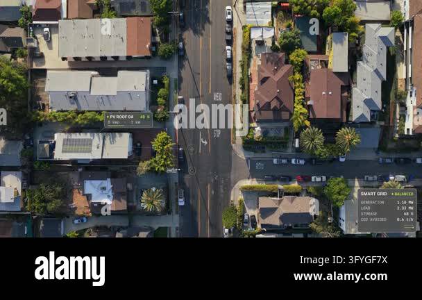 Aerial top down tracking shot over Los Angeles, USA: rooftop solar ...