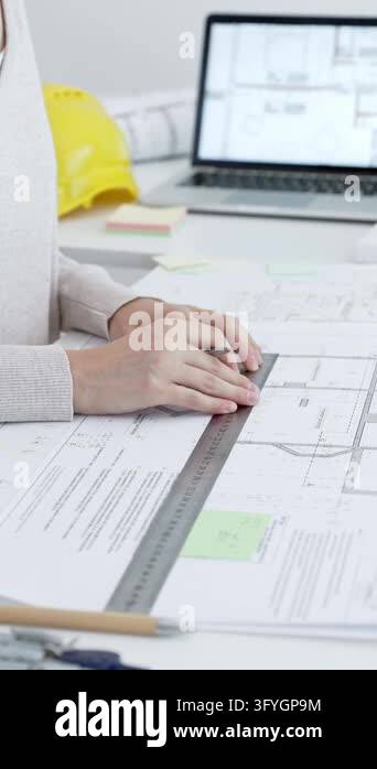 Workign Drawing Engineering Female architect drawing blueprints, designing building plans at desk ...
