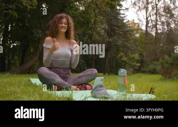 Smiling woman sport influencer talking with online mobile phone video ...