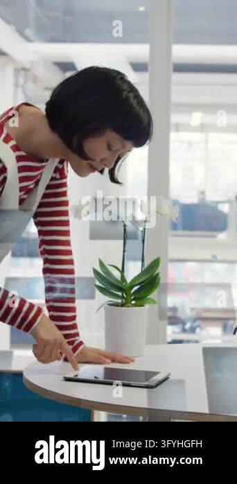 Animation of radars, graphs and computer language over asian woman ...