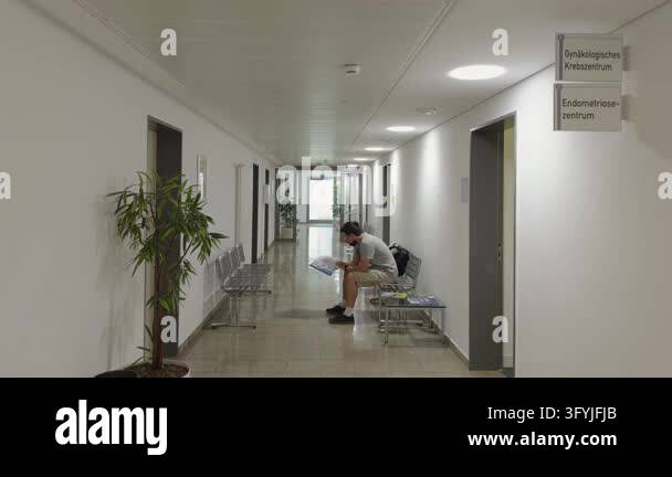 Medical Channel Center Visitor or patient waiting outside specialized clinics in a German ...