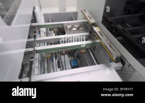 Circuit board panel moving on automated conveyor. SMT production line ...