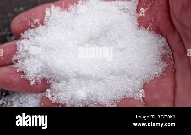 White Epsom salt (magnesium sulfate heptahydrate) crystals piled in ...