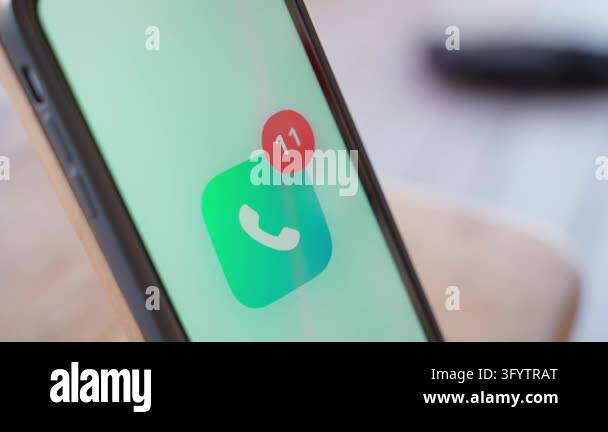 Phone app icon with growing missed calls badge on smartphone screen ...