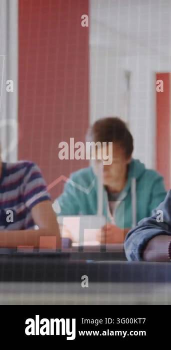 Binary code animation over students using tablets and writing in ...