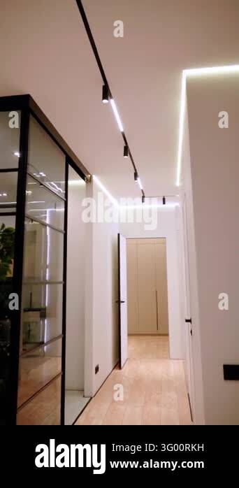 Modern Apartment Corridor with Continuous Recessed LED Lighting ...
