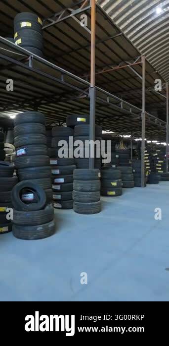 Stacking Cargo Signage Close View of Stacked Car Tires on Steel Warehouse Storage Racks ...