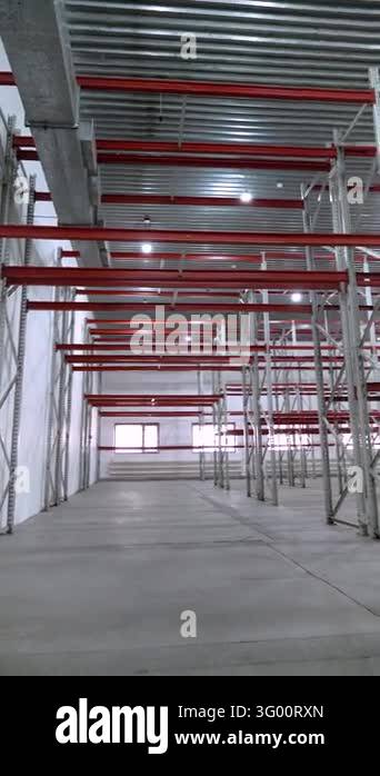 Empty Storage Warehouse with Heavy Duty Steel Shelving Vertical moving ...