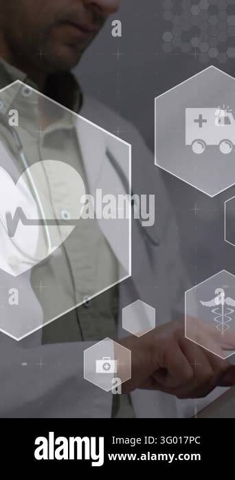 Animation of medical icons over caucasian male doctor using digital ...