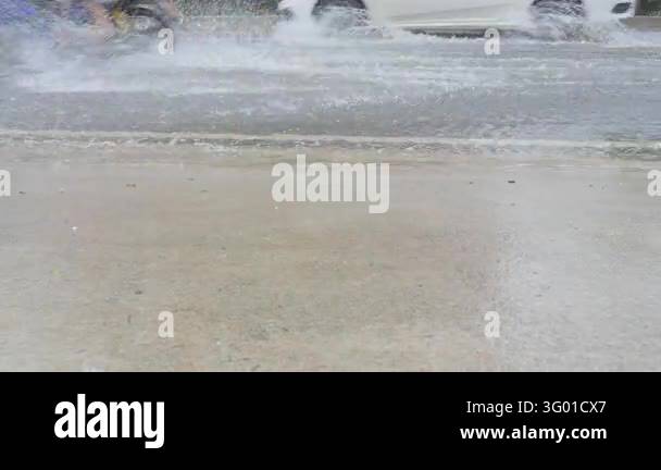Has Stock The vehicle is partially submerged in deep rainwater that has ...