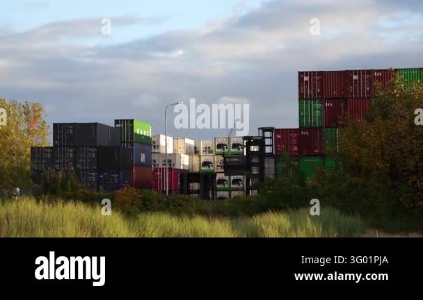 Stacking Cargo Signage Gdansk, Poland - October 14, 2026: Stacked colorful shipping containers ...