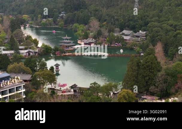 Pool Wiver Black Dragon Pool in Lijiang, Yunnan, China. Aerial shot at evening ...