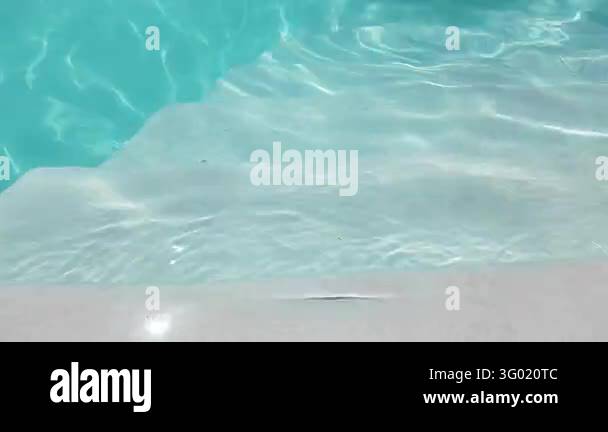 Pool Wiver Beautiful outdoor swimming pool with crystal clear blue water on a ...