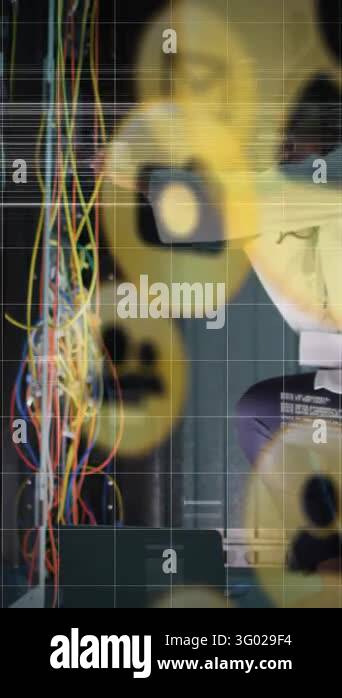 Vertical video: woman IT tech receiving overlay icons checking cables ...