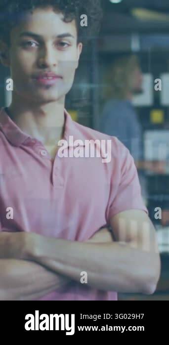 Vertical video: Graphics appearing and sweeping over centered man ...
