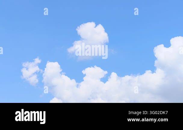 Blue sky background with soft white clouds on a clear sunny day Stock ...
