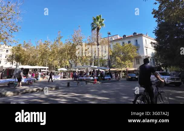 France Tree Antibes, France - September 15, 2026 - An outdoor street market draws ...