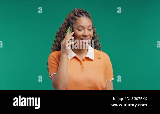 Attractive young teen girl talking by phone, smiling. Student lady ...