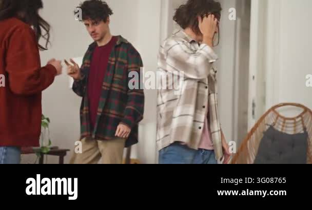 Up close dynamic scene of friends moving and packing furniture into ...