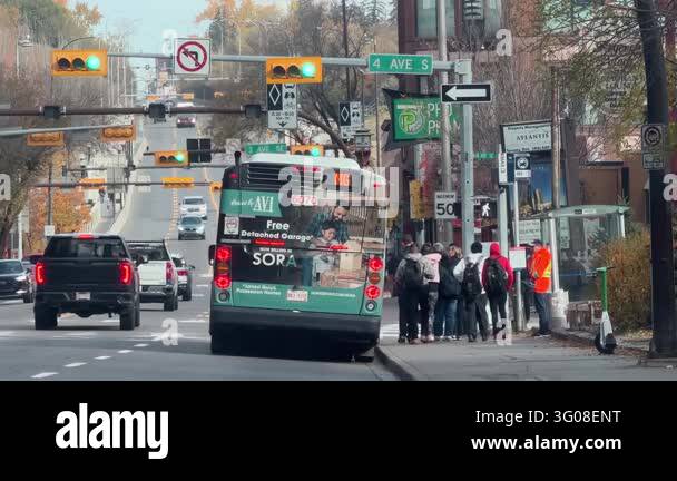 Calgary, Alberta, Canada. October 18, 2026. Rear view of a city transit ...