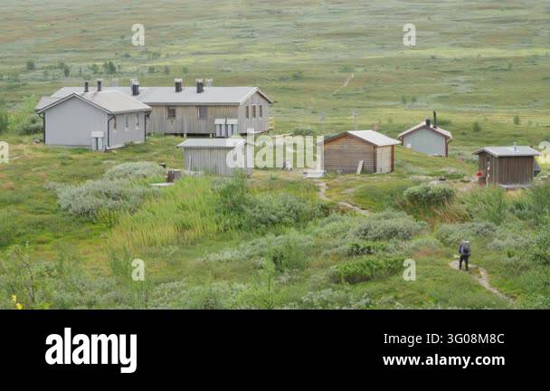 Footage of a lone hiker on the renowned Kungsleden trail in Sweden ...