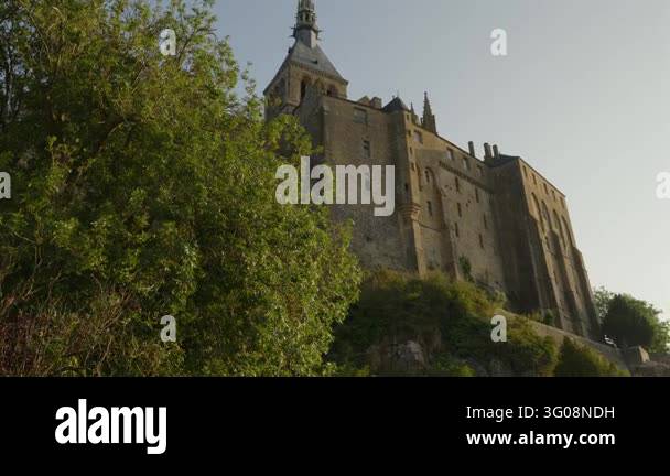 France Tree Low angle view of Mont Saint Michel Abbey with massive medieval stone ...