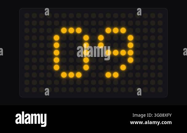 LED dot matrix countdown timer with amber digits switching on a dark ...