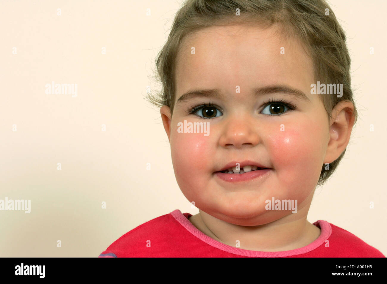 Amelie daughter girl 1 2 3 years smile little eyes look loving cuddling  commitment pink happiness beauty cool stuffy toy kid Stock Photo - Alamy