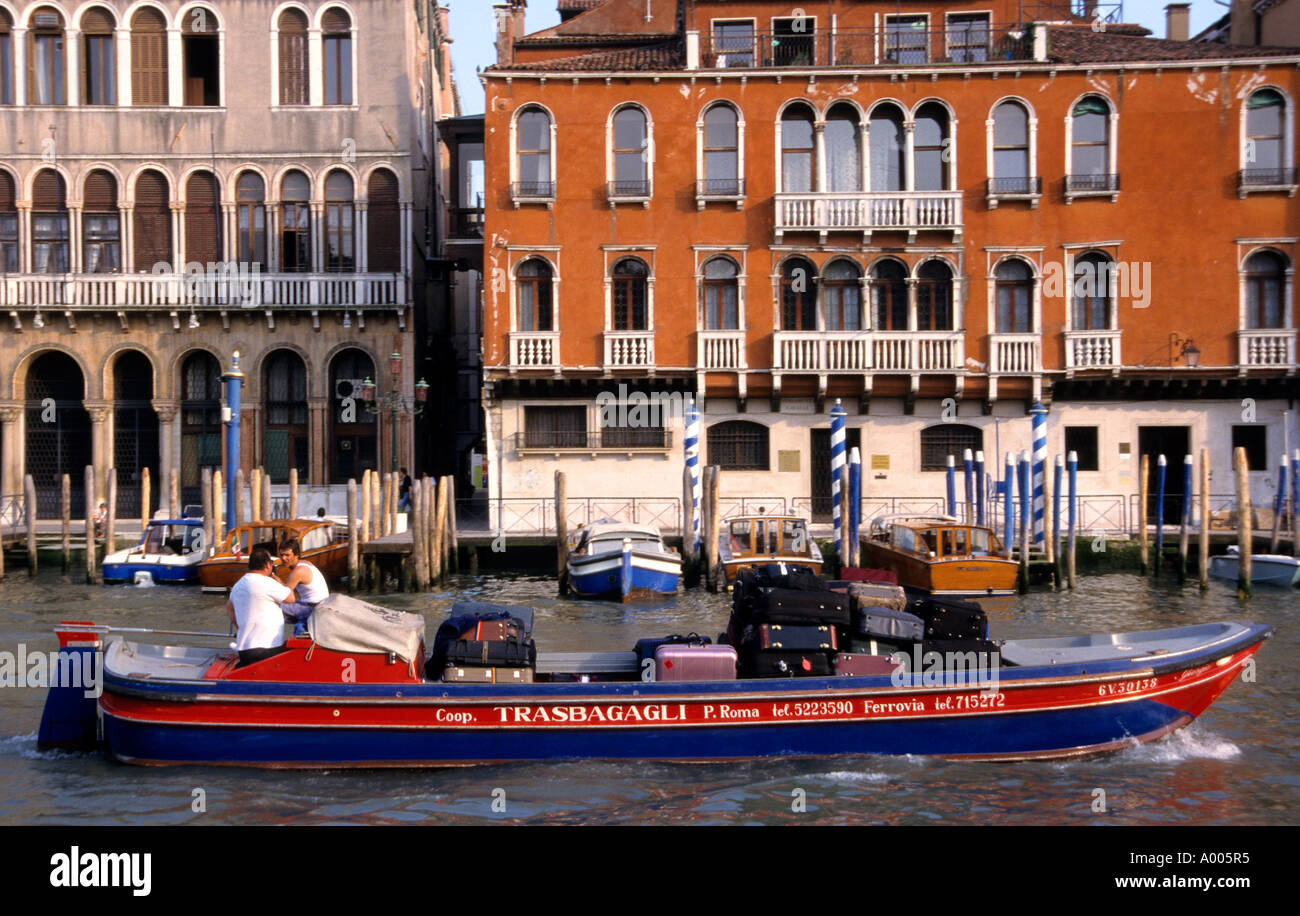 Italy Venice canal hotel transport boat luggage Stock Photo Alamy