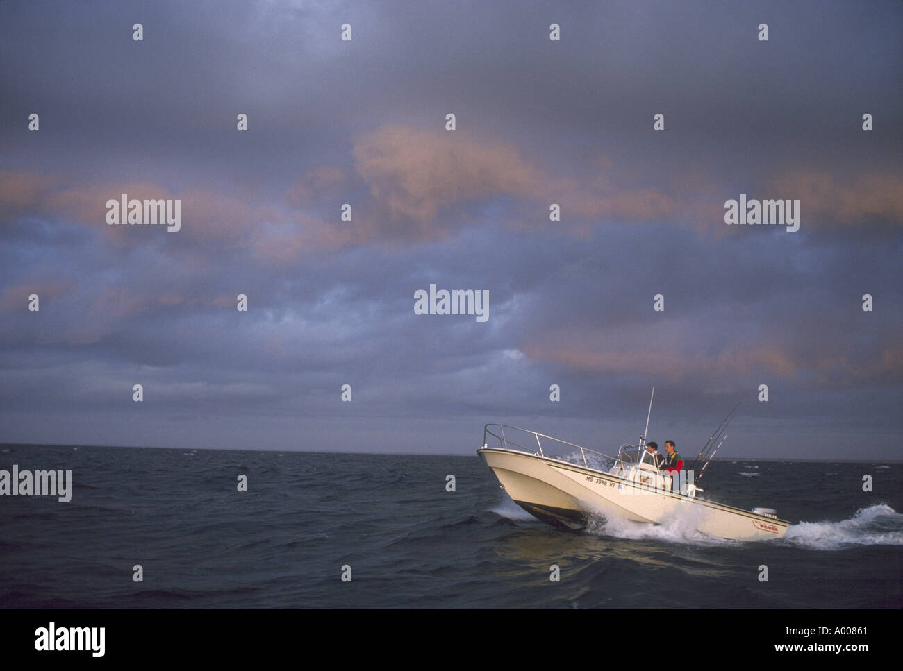Boat in rough water Stock Photo Alamy
