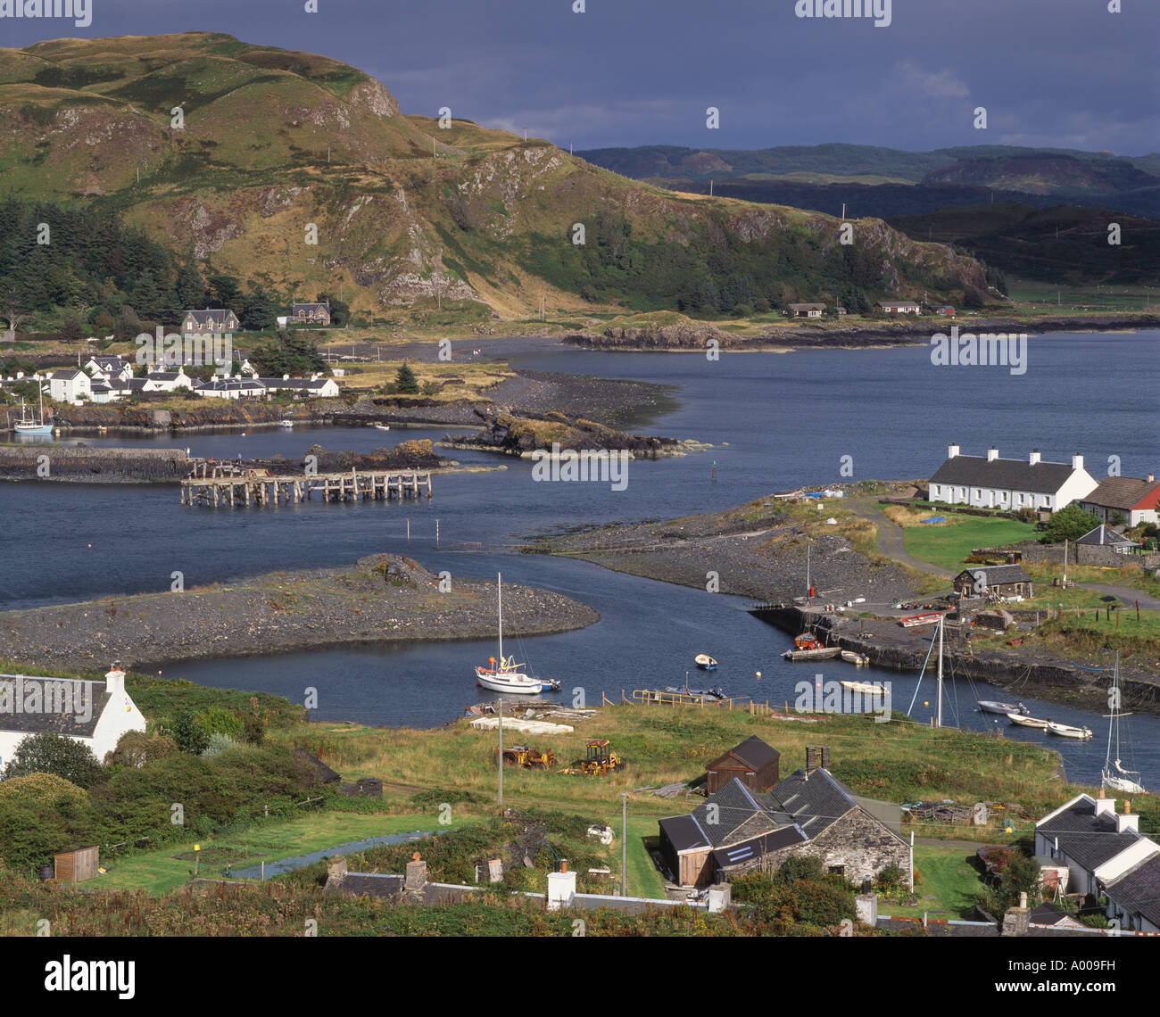 View over Easdale Island to Ellenabeich or Easdale on Seil, Argyll and Bute, Scotland, UK Stock Photo