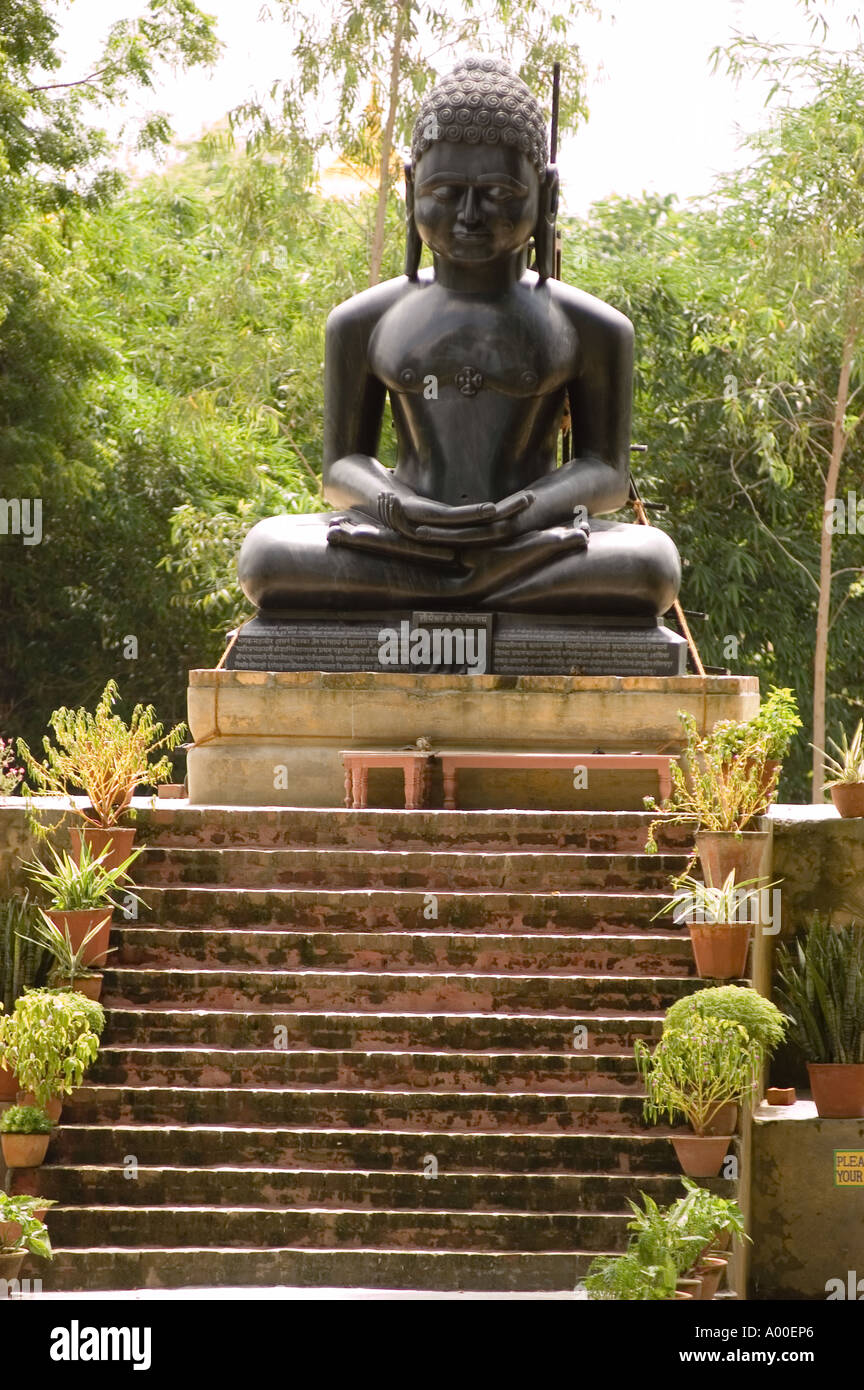 Black statue of Mahavira founder of Jainism religion Sarnath Varanasi Uttar Pradesh India Stock Photo