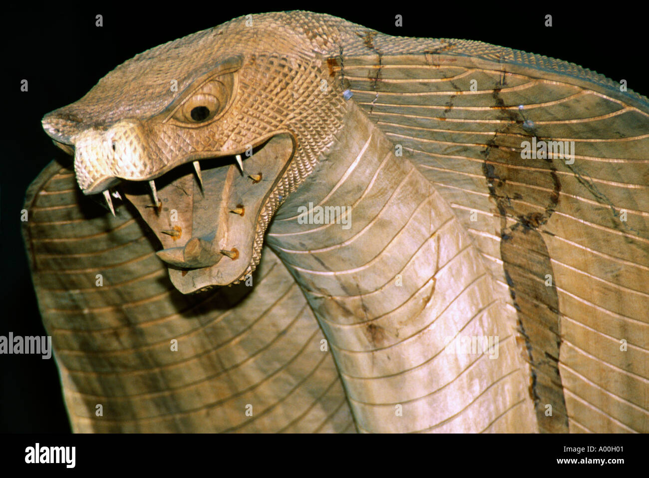 large wooden carving in the shape of a cobra head near ubud bali indonesia  Stock Photo - Alamy