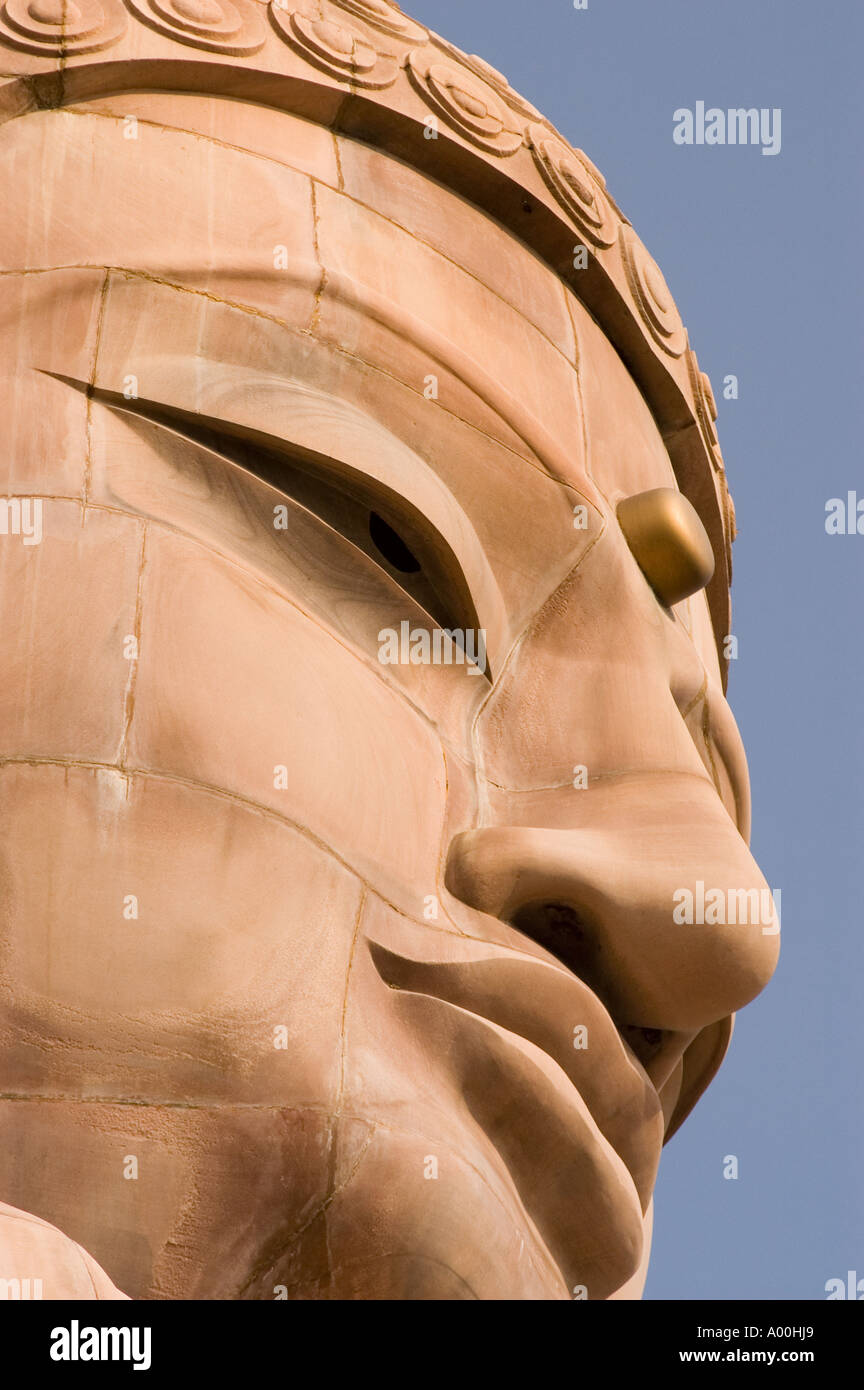 Face close up of Giant limestone statue of Buddha in Bodhgaya Bihar India Stock Photo