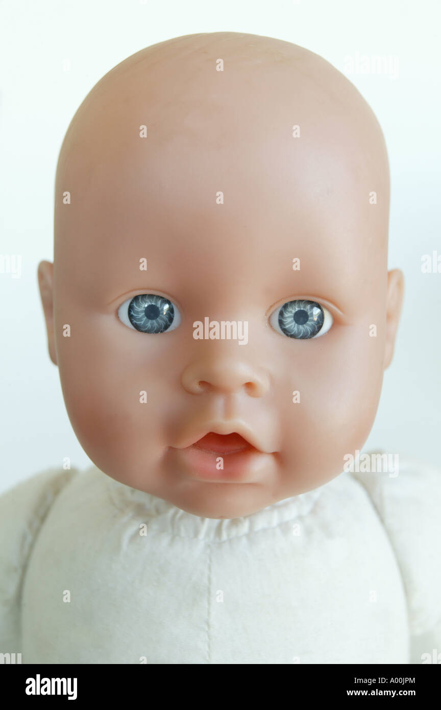Detail of dolls face with big blue eyes Stock Photo - Alamy