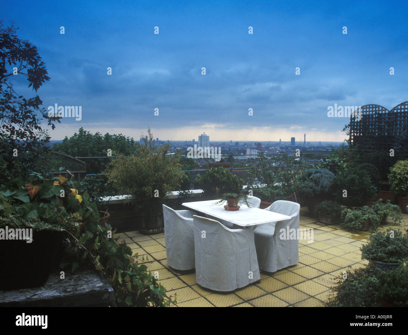 terrace with table with a view over the city of London Stock Photo