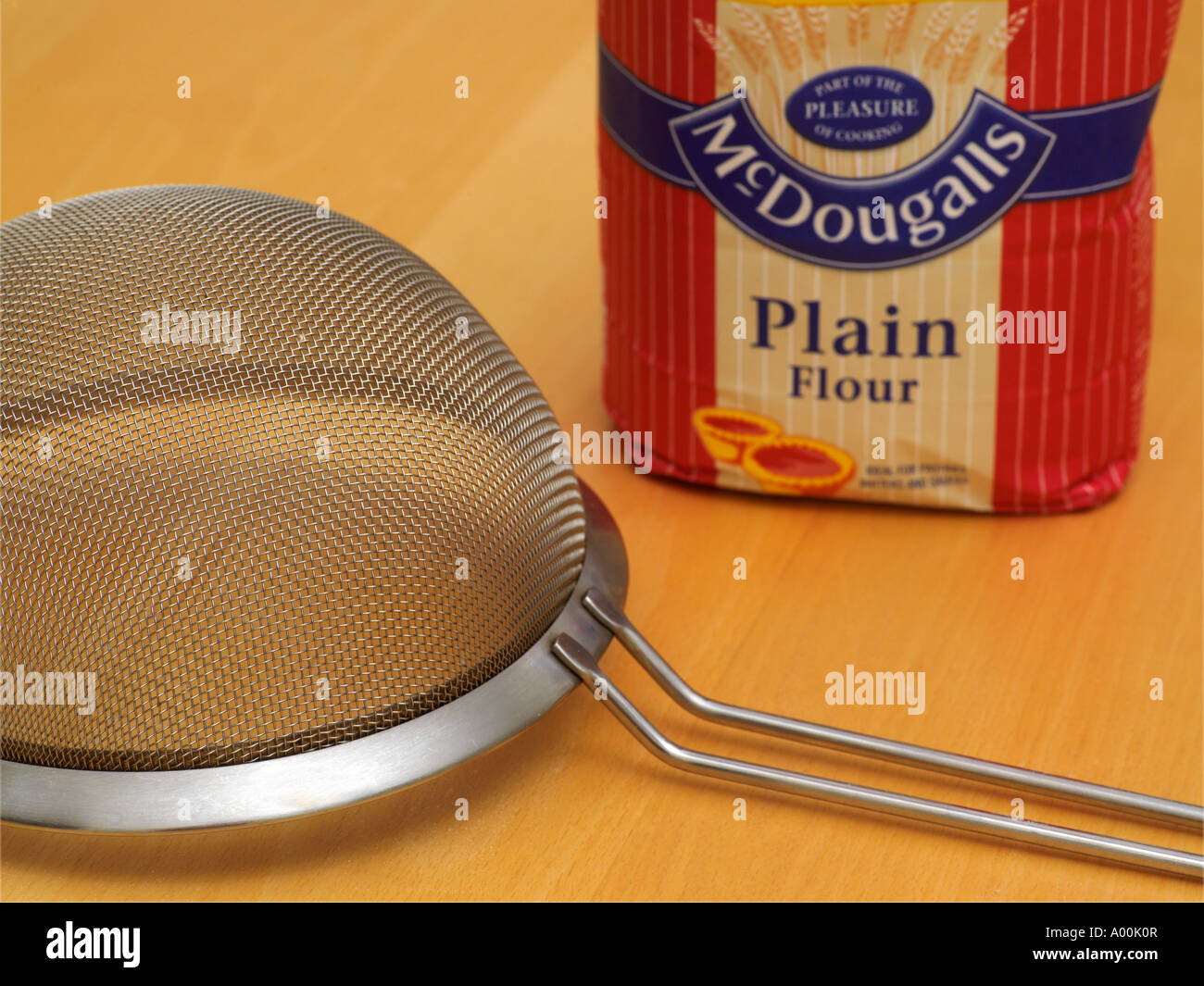 Plain Flour and Sieve Stock Photo Alamy