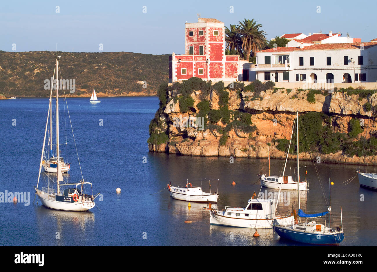 dh Cales Figuera ES CASTELL MENORCA Pleasure boats and yachts anchored in bay sailing boat balearic holiday Stock Photo