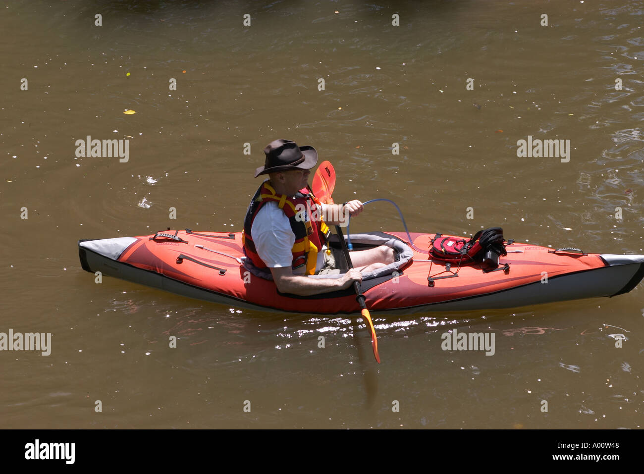 Steering the Kayak on the calm waters of the Delaware and Raritan Canal in  New Jersey USA Stock Photo - Alamy