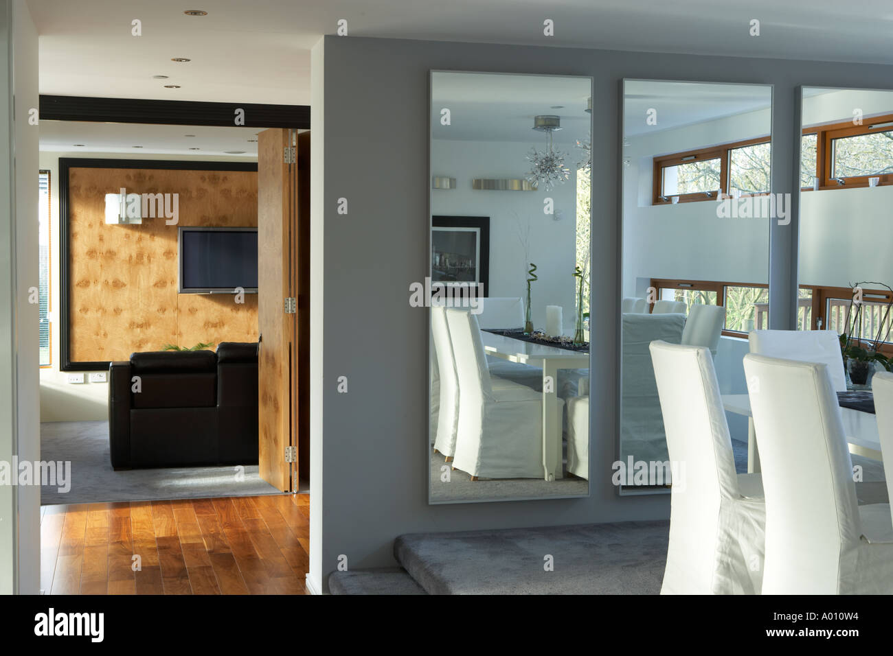 passage in modern house leading to lounge Stock Photo Alamy