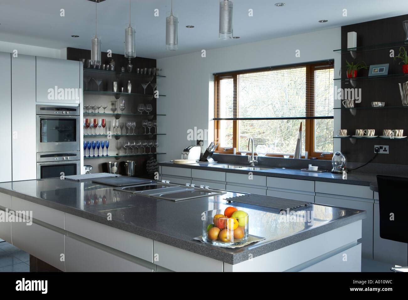 kitchen with central food preparation area in modern house Stock Photo