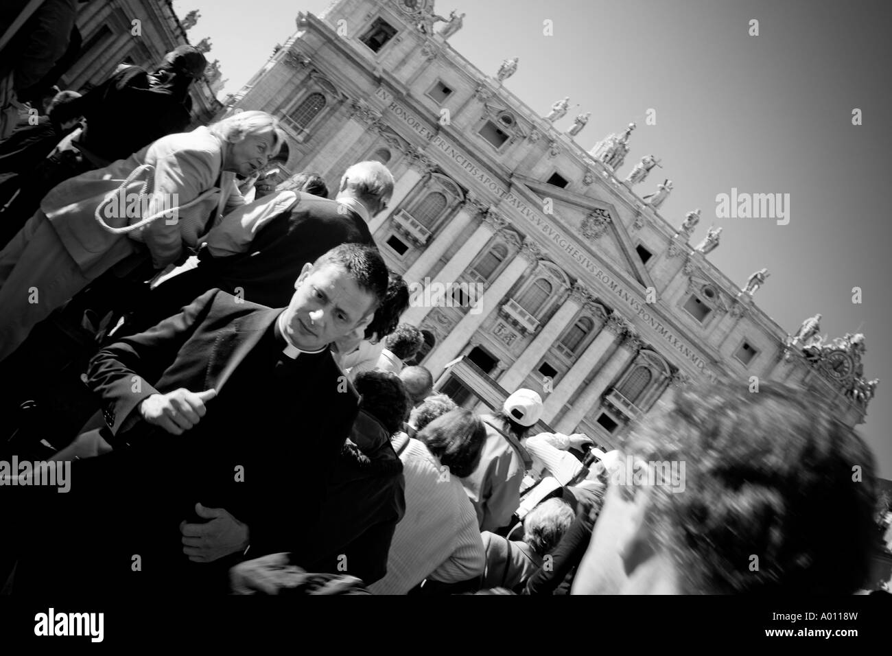 preist caught in a frenzy at the vatican Stock Photo