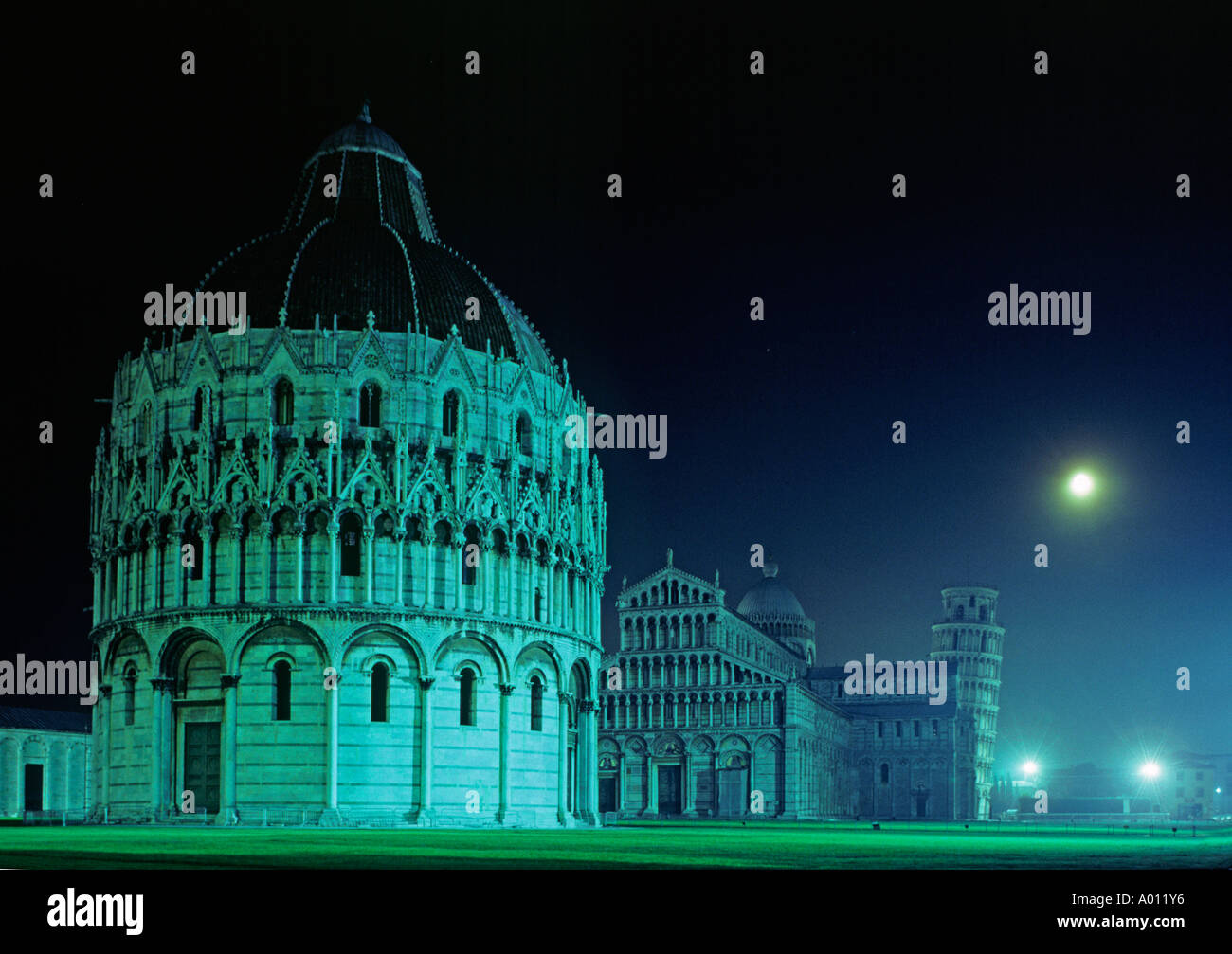 Full moon rises over The BAPTISTERY CATHEDRAL The LEANING TOWER OF PISA 12th Cent PISA ITALY Stock Photo