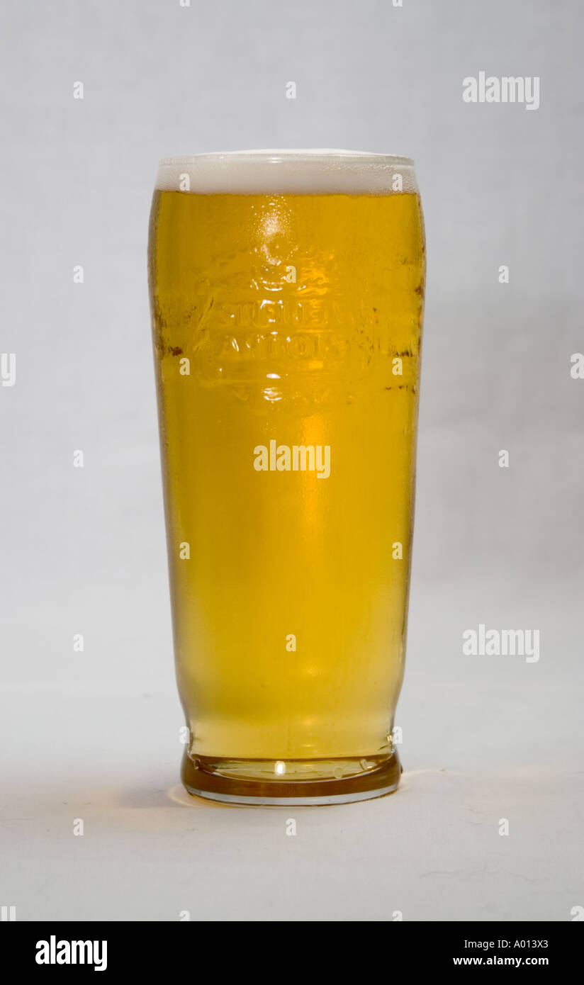 A pint of Stella Artois lager in a Stella Artois glass Stock Photo Alamy
