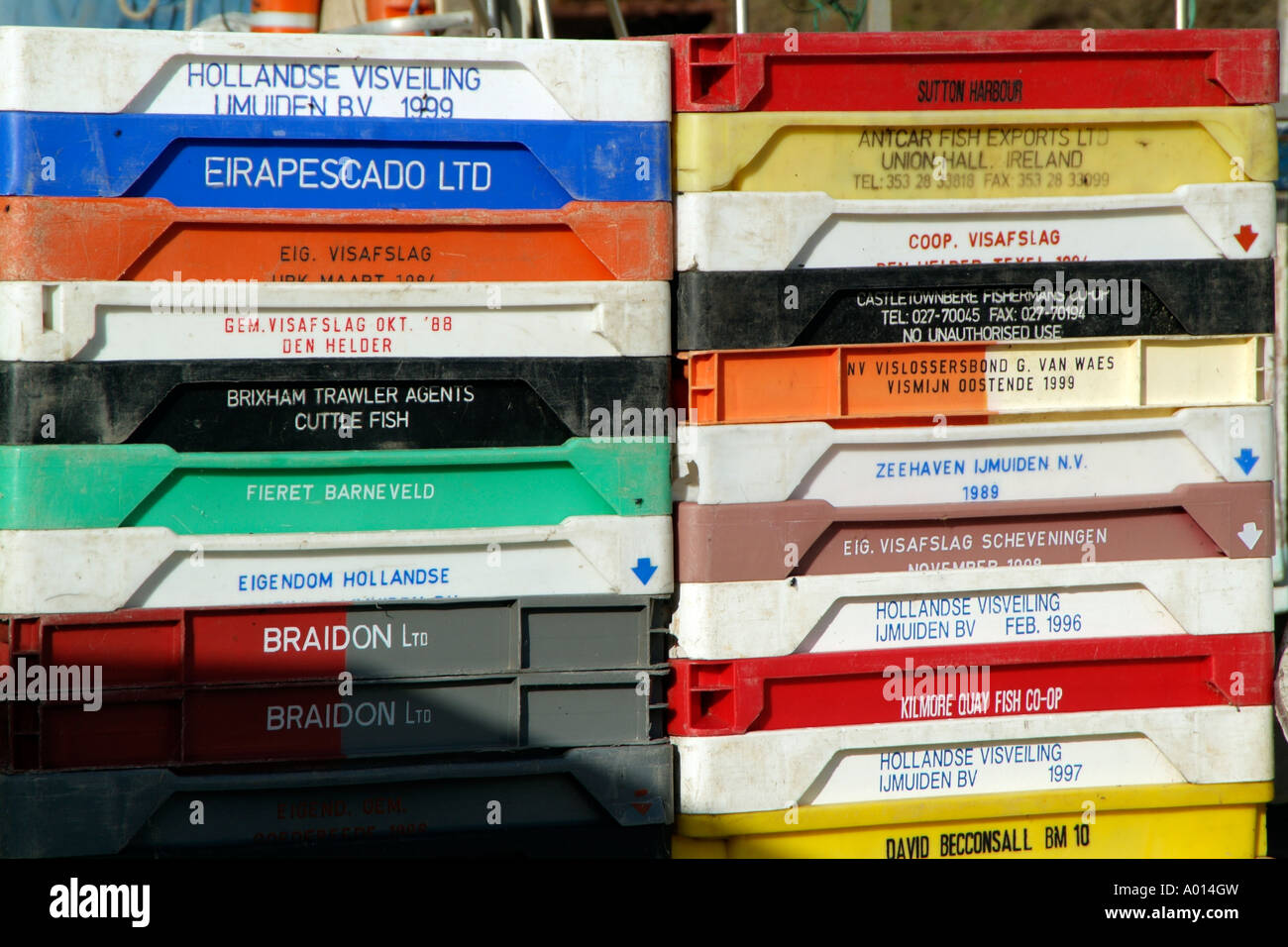 Stack of fish boxes. Fishing industry England UK Stock Photo - Alamy