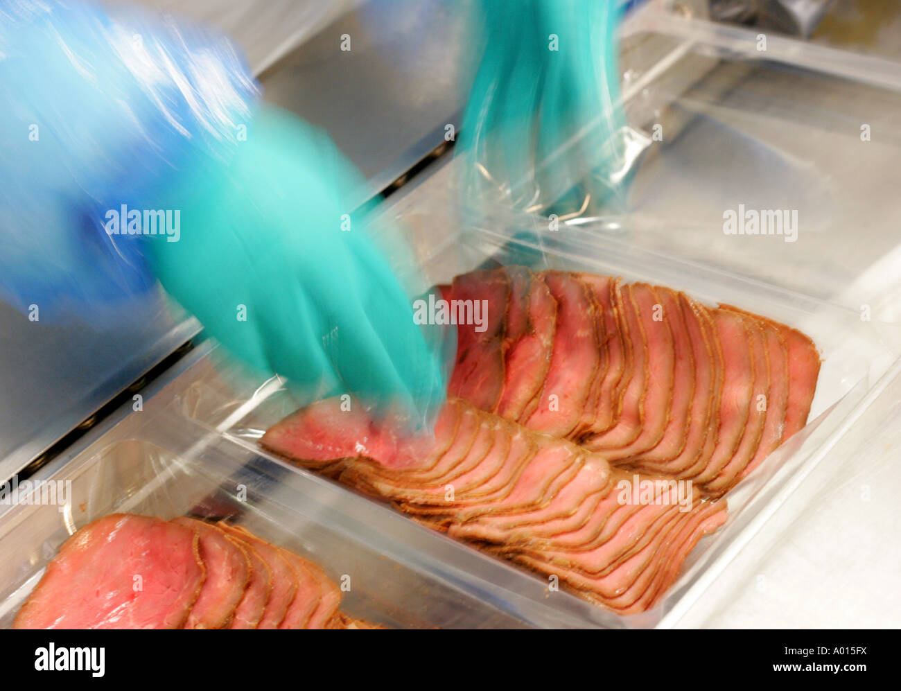 Meat packing plant, packing of roast beef Stock Photo Alamy